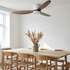 Javel Nordic white wood ceiling fan with light in a Scandinavian dining room