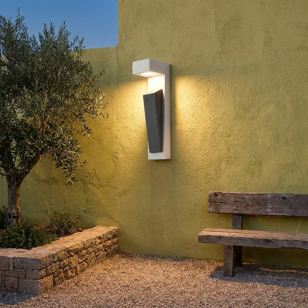 White cement wall light washing plaster courtyard wall with olive tree at dusk