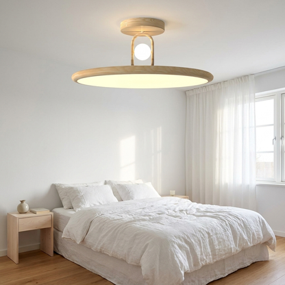 Rowena natural wood round semi flush ceiling light in a bright Scandinavian bedroom