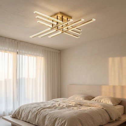 Crosby gold cross LED ceiling light in a calm minimalist bedroom