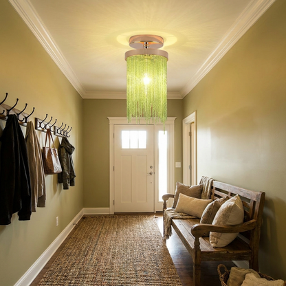 Odetta green metal tassel chandelier in a welcoming entry with bench and runner