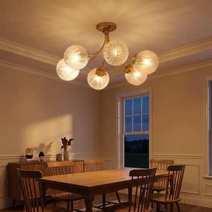 Verriere carved glass brass ceiling light above an American style dining room