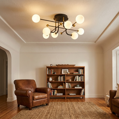 Vesta sputnik globe ceiling light in a relaxed living room with leather chair