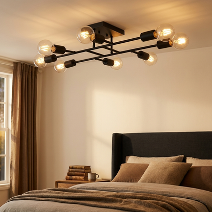 Marlon matte black sputnik ceiling light in a calm bedroom with dark headboard