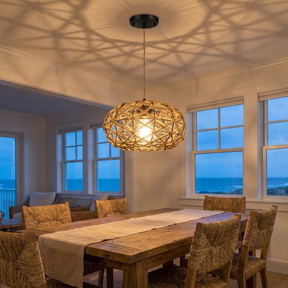 Nessa hand woven rope pendant light above a coastal dining table