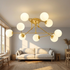 Auric gold branching sputnik ceiling light in a Nordic living room