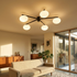 Brume glass bubble semi flush ceiling light in a mid century living room