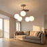 Verdon grey spiral glass globe ceiling light in a modern living room