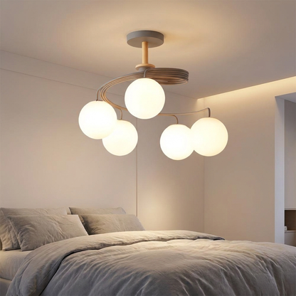 Verdon grey spiral glass globe ceiling light in a serene bedroom