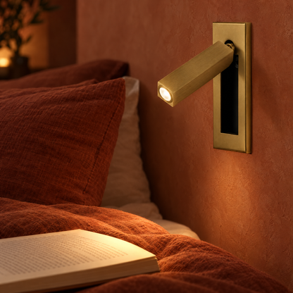 Lumo Recessed Bedside Reading Sconce in Copper, close-up beside a bed
