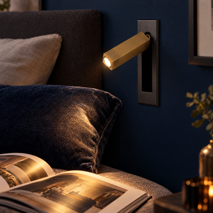 Lumo Recessed Bedside Reading Sconce in Matt Black and Copper, close-up beside a bed