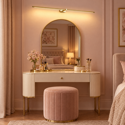Kova Rechargeable Linear Wall Light in Gold above an arched mirror and dressing table