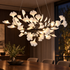 Horizon Ceramic Ginkgo Leaf Chandelier in Black, close-up above a dining table