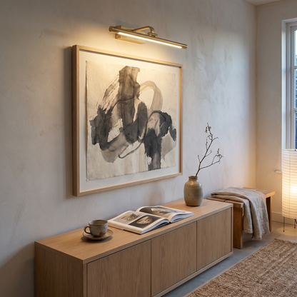 Brillan Model A gold LED picture light in a Japandi living room