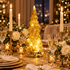 Sylvie gold glass Christmas tree lamp on a holiday dinner table