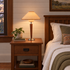 Talonwood table lamp in tan on a nightstand in a Craftsman bungalow bedroom