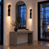 Palomino wall sconce in black in a Manhattan loft entryway