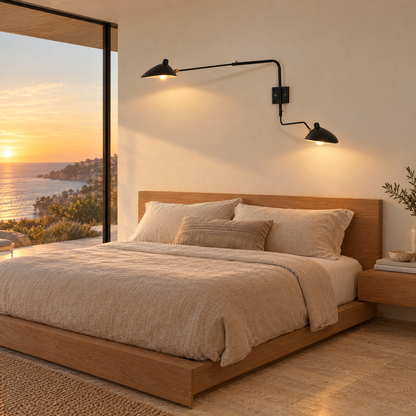 Rivoli swing arm wall sconce in Black, two-arm in a Malibu contemporary bedroom