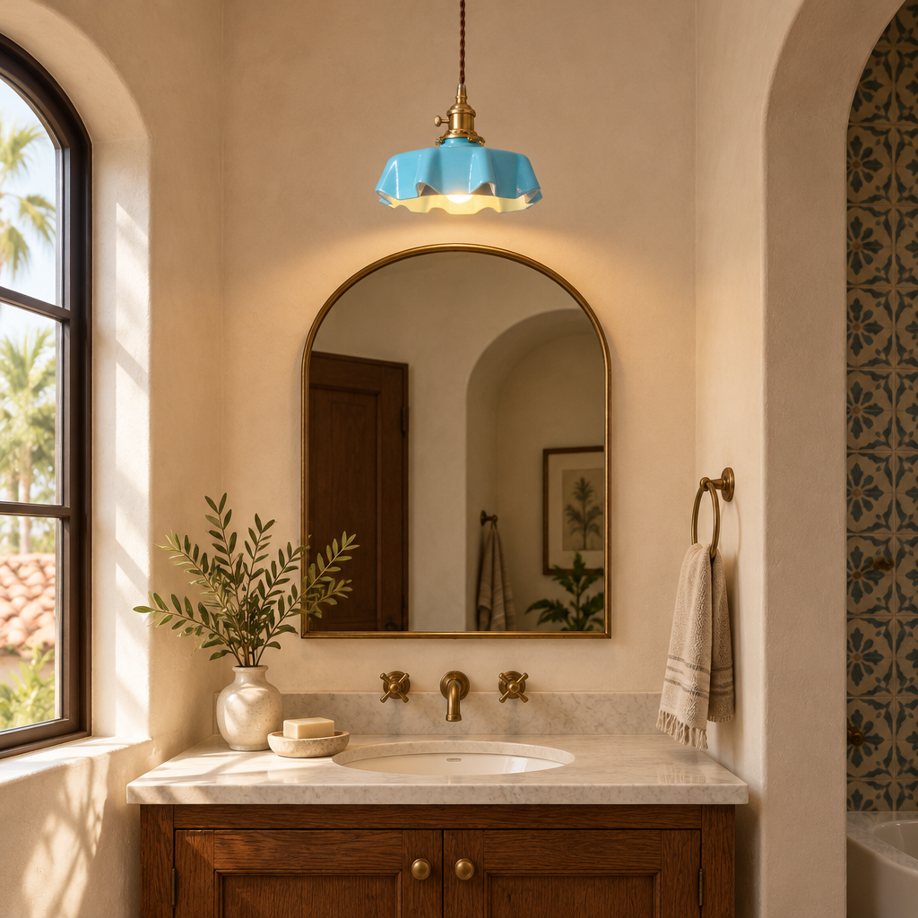 Hyacinth Pleated Glass Pendant Light, 1 Light Brass and Blue, in a Southern California Spanish bungalow bathroom with a vanity and arched mirror