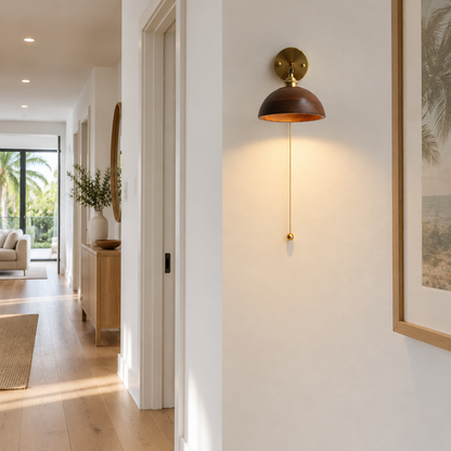 Elm Walnut Wood Wall Sconce, Model A, in a Florida modern home hallway with light wood floors and white walls