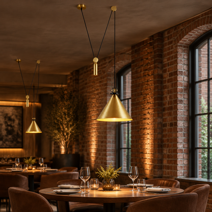 Kubik Geometric Modular Chandelier, Section A Gold, in an upscale restaurant dining room in a renovated brick building