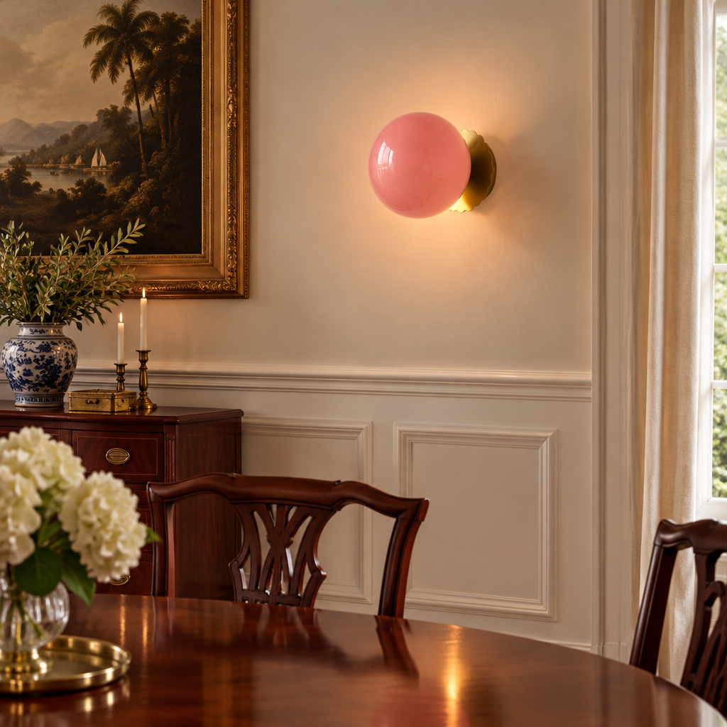 Wisp Glass Wall Sconce, Gold and Pink, in a colonial style dining room with wainscoting and a mahogany table