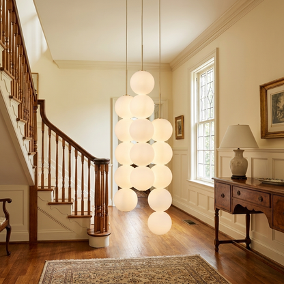 Perlette 3 heads pendant light in the entry foyer of a colonial style home