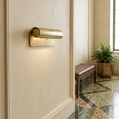 Albane 10 inch wall sconce in the lobby of a boutique hotel with terrazzo floors
