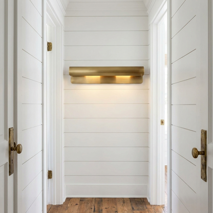 Albane 19.7 inch wall sconce on a white shiplap hallway wall of a modern farmhouse