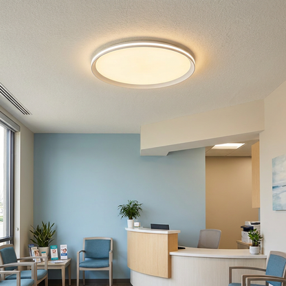 Clio white ceiling light in the reception area of a modern American dental office