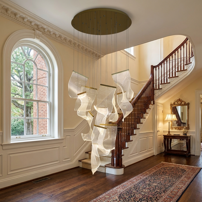 Cirrane 12 heads gold chandelier in the foyer of a Georgian brick home in Virginia