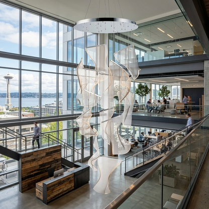 Cirrane 12 heads silver chandelier in the atrium of a modern Seattle tech office