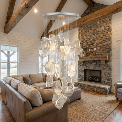 Cirrane 28 heads silver chandelier above a sectional in a Nashville modern farmhouse living room
