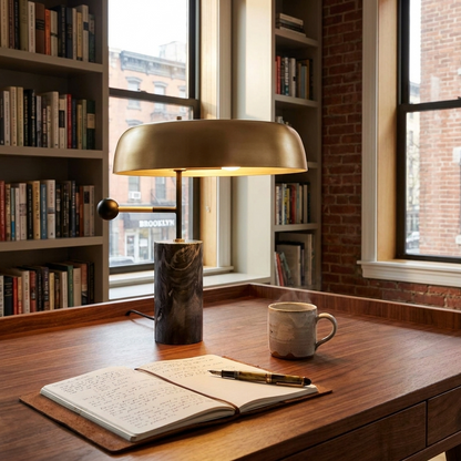 Barclay marble table lamp with gold dome shade on a walnut desk in a brownstone home office