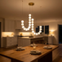 Nacre pearl chandelier over the dining table in a suburban family home