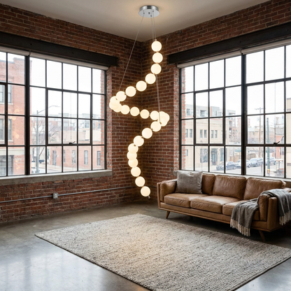 Nacre tall spiral pearl chandelier in a Denver loft living room