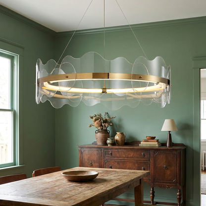 Rivage round LED chandelier over a dining table in a Nashville bungalow