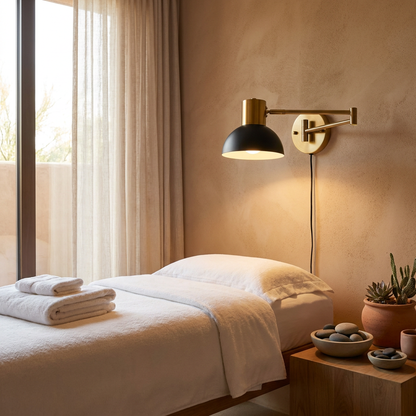 Swivo plug in swing arm wall lamp in a spa treatment room