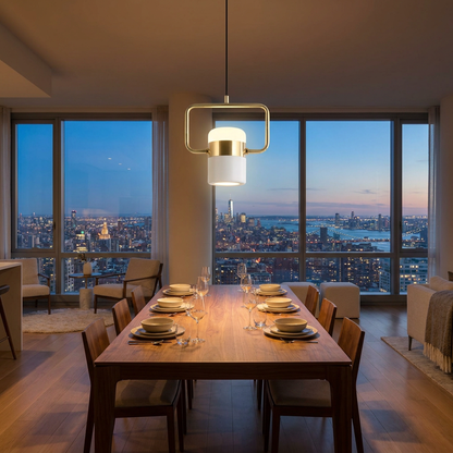 Marisol small LED pendant light over a dining table in a Manhattan apartment