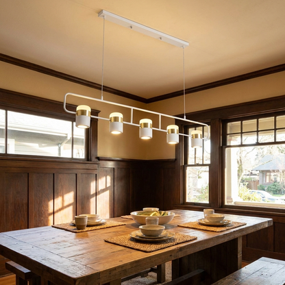Marisol long linear LED pendant light over a dining table in a Craftsman home