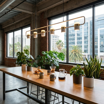 Marisol extra long linear LED pendant light over an office breakroom table