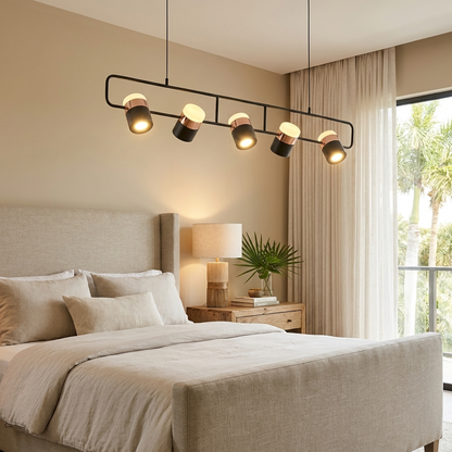 Marisol long linear LED pendant light over a nightstand in a primary bedroom