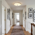 Saverio Travertine Ring Flush Mount in Yellow Travertine & White upstairs hallway