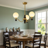 Ulyana brass and walnut glass globe chandelier, 3 lights, over a suburban dining table