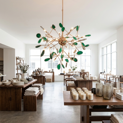 Calliste 20-head green agate rose gold chandelier in an empty Charlotte home decor store