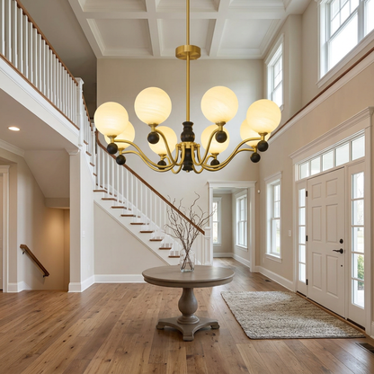 Ulyana brass and walnut glass globe chandelier, 8 lights, in a two-story foyer