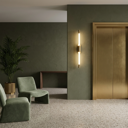Abelle slim tube LED wall sconce in Gold, hotel lobby, Miami FL