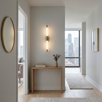 Abelle slim tube LED wall sconce in Gold, apartment hallway, Chicago IL