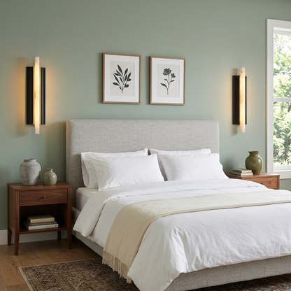Pair of Amelie black blade alabaster wall sconces beside a bed in a suburban bedroom