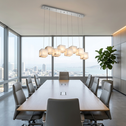 Ariane 8-light linear alabaster cube chandelier in silver over a San Francisco office conference table